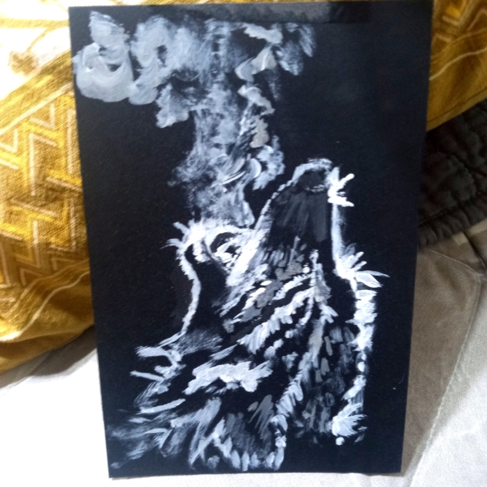 My art "wolf howl" white acrylic on black cowhide. 5 3/4" x 3 3/4"